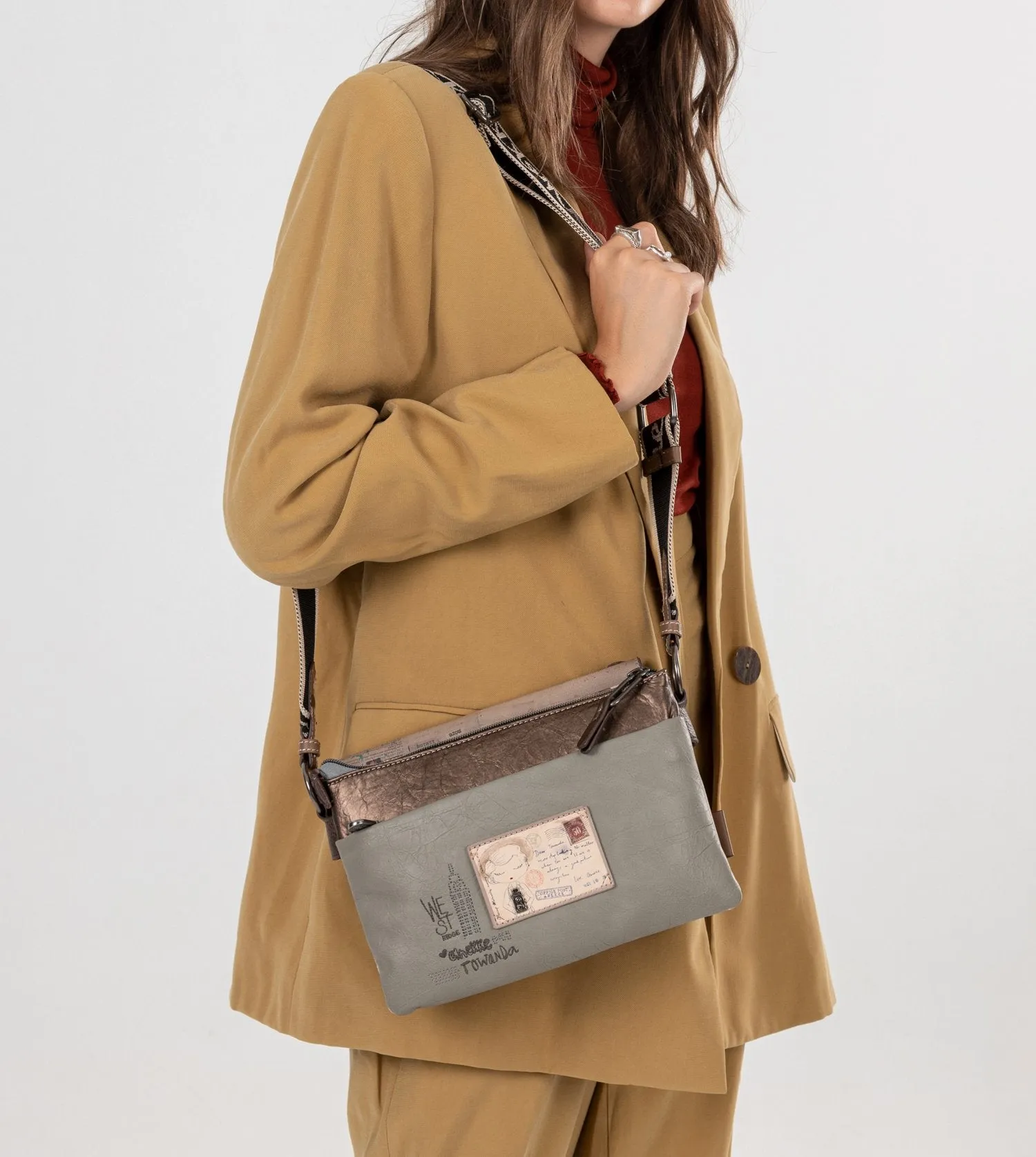 Voice-controlled crossbody bag with a Authenticity International delivery flap